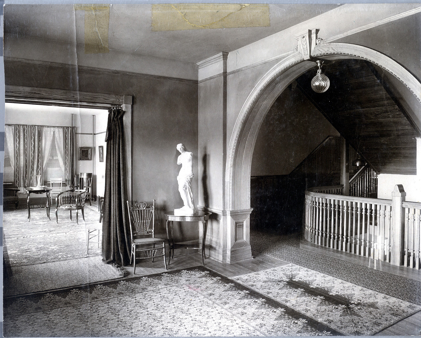 Ticknor Hall Main East Entry looking towards South Parlor Early 1900's <span class="cc-gallery-credit"></span>